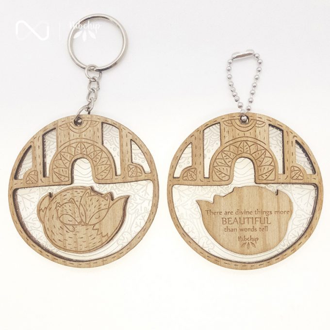 fox sleeping wooden keychain front and back top view