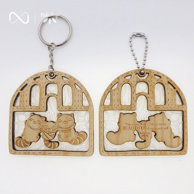 raccoon family wooden keychain front and back topview